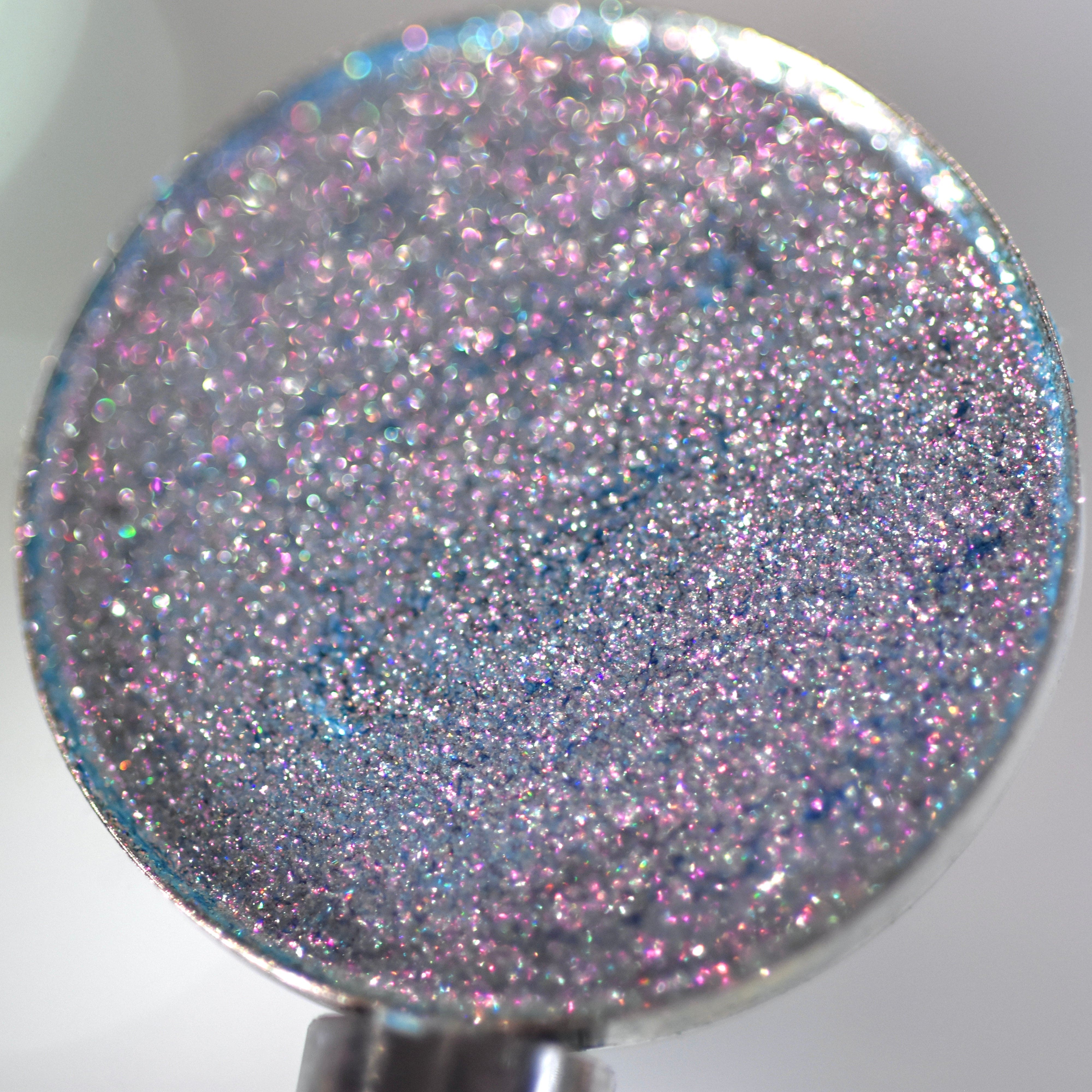 Sparkle cool tones blue eyeshadow with pink and purple color shift